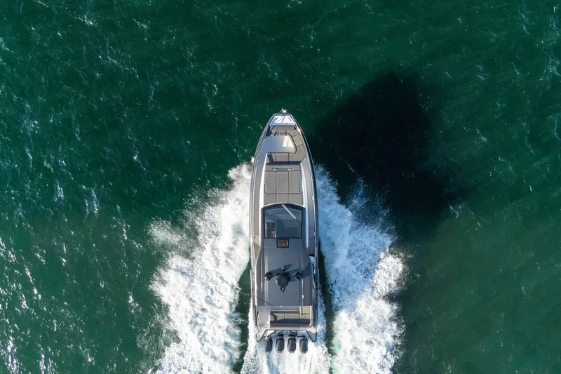 Slide: The Image of Aerial view of 2023 Azimut Verve 47 yacht cruising on open water. - 11
