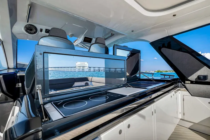 Slide: The Image of Luxurious 2023 Azimut Verve 47 yacht interior with modern kitchen and ocean view. - 27