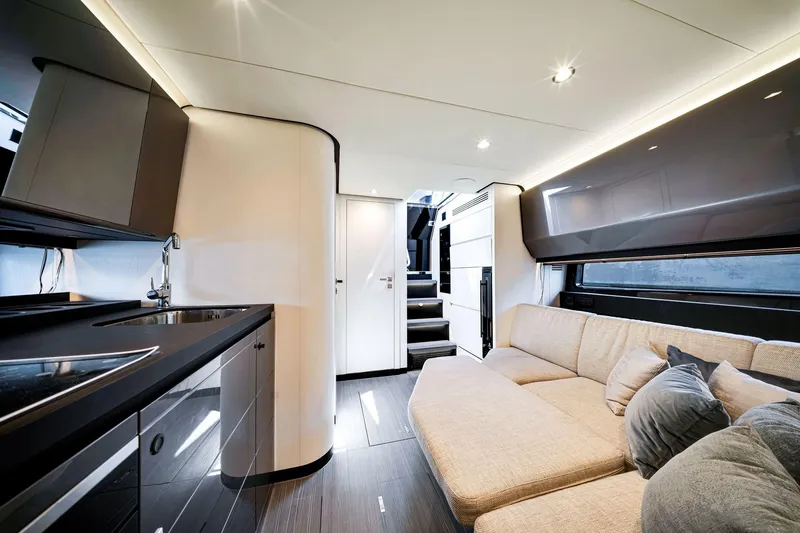 Slide: The Image of Luxurious interior of 2023 Azimut Verve 47 yacht with modern kitchen and cozy seating area. - 32