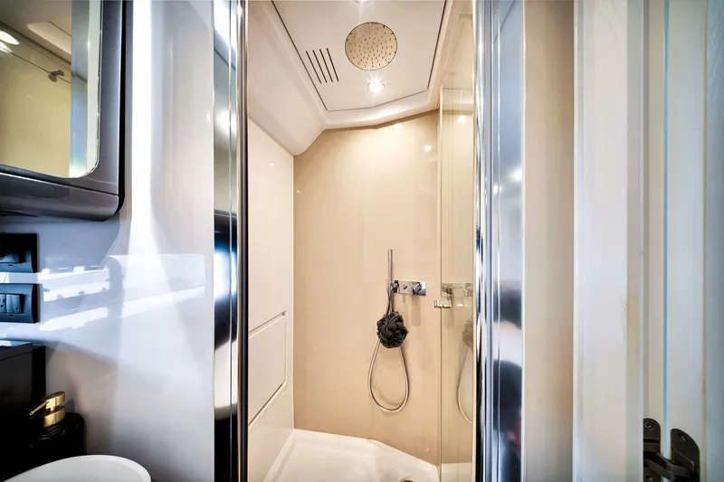 Slide: The Image of Luxurious bathroom interior of 2023 Azimut Verve 47 yacht, featuring modern shower design. - 35