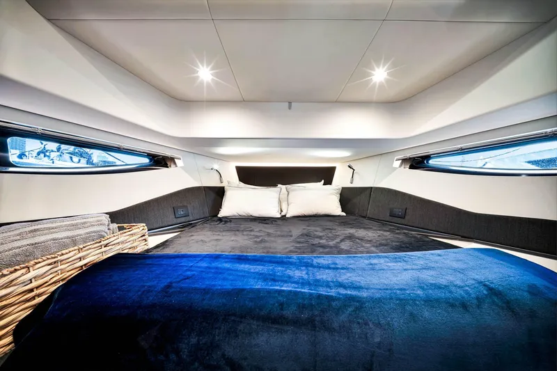 Slide: The Image of Luxurious interior cabin of 2023 Azimut Verve 47 yacht with plush bedding. - 36