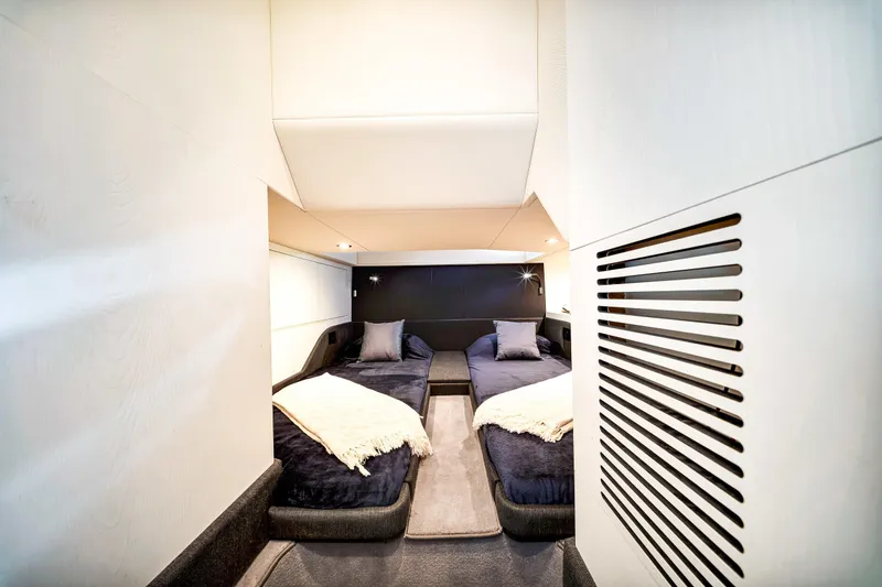 Slide: The Image of Luxurious interior cabin of 2023 Azimut Verve 47 yacht with twin beds and modern design. - 40