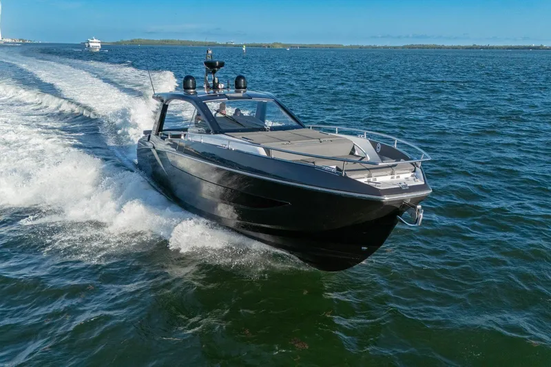 Slide: The Image of 2023 Azimut Verve 47 luxury yacht cruising on open water. - 5