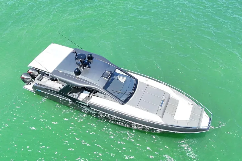 Slide: The Image of 2023 Azimut Verve 47 luxury yacht cruising on turquoise waters. - 7