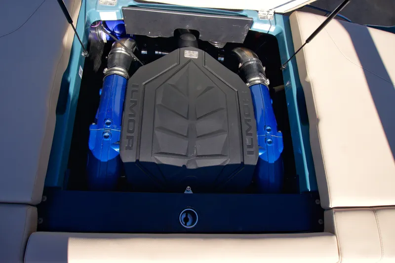 Slide: The Image of 2025 MasterCraft NXT20 engine compartment with blue accents. - 11