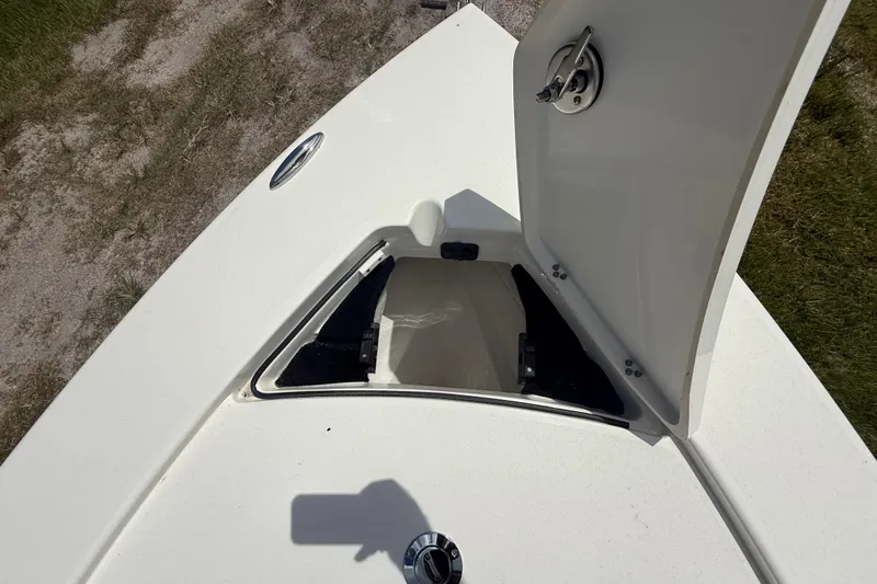 Slide: The Image of Open storage compartment on 2026 Pathfinder 2300 HPS boat deck. - 40