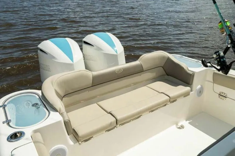 Slide: The Image of 2026 Key West 263 FS boat with dual engines and comfortable seating on the water. - 9