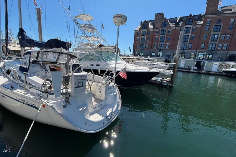Slide: The Image of Bavaria Cruiser 33 sailboat docked in marina, 2007 model, sunny day. - 3