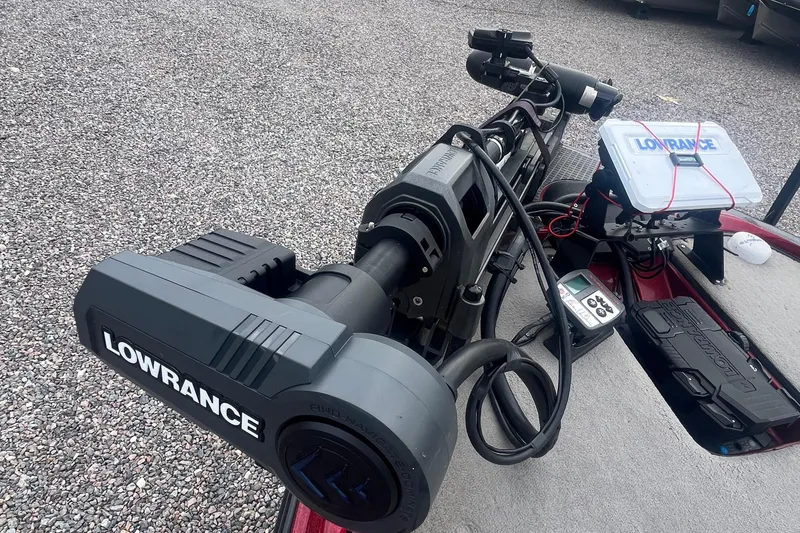 Slide: The Image of 2009 Triton 21X3 Pro DC boat with Lowrance equipment on deck. - 15