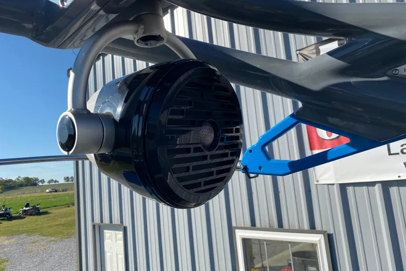 Slide: The Image of Close-up of a 2023 Berkshire 23UL boat speaker mounted on a metal frame. - 11