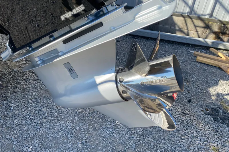 Slide: The Image of 2023 Berkshire 23UL boat propeller, Revolution X, on gravel surface. - 6