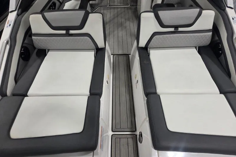 Slide: The Image of 2023 Yamaha Boats 275SDX interior with sleek, modern seating and stylish design. - 15