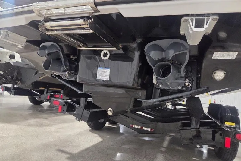 Slide: The Image of 2023 Yamaha Boats 275SDX jet propulsion system on trailer, showcasing dual engines. - 22