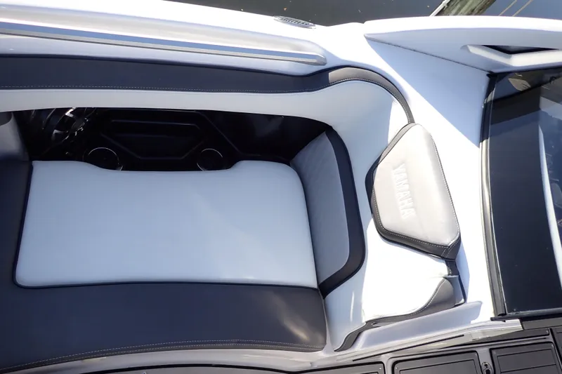 Slide: The Image of 2023 Yamaha Boats 275SDX interior seating with sleek, modern design and comfortable upholstery. - 26