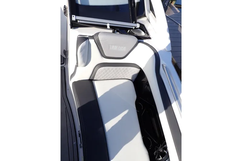 Slide: The Image of 2023 Yamaha Boats 275SDX interior seating with sleek, modern design and premium materials. - 27