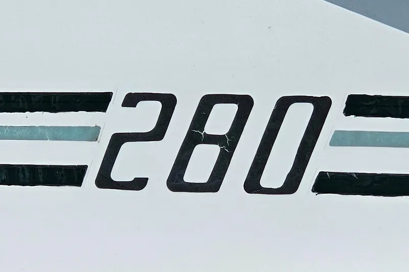 Slide: The Image of Close-up of '280' decal on 1989 Sea Ray 280 Sundancer boat. - 22
