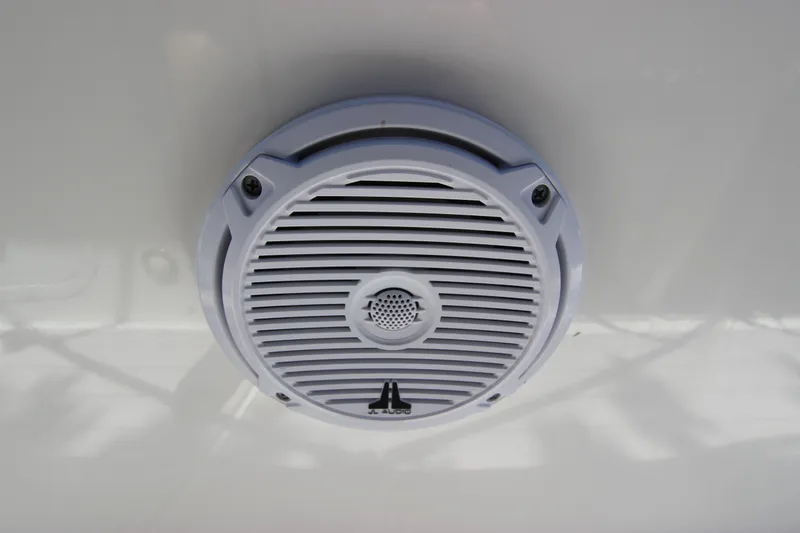 Slide: The Image of Boat speaker on 2017 Boston Whaler 270 Dauntless, white grille, mounted on surface. - 22