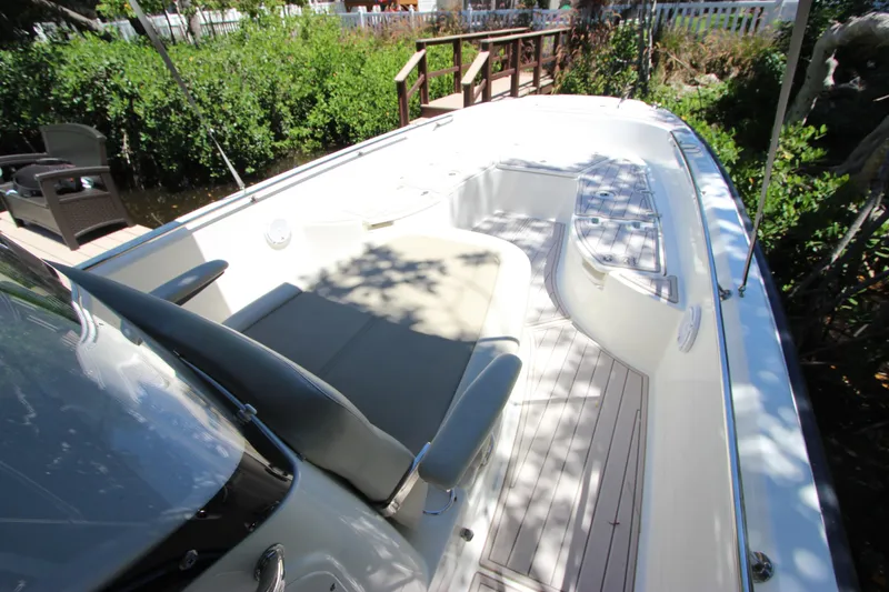 Slide: The Image of 2017 Boston Whaler 270 Dauntless boat interior with seating and deck view. - 24