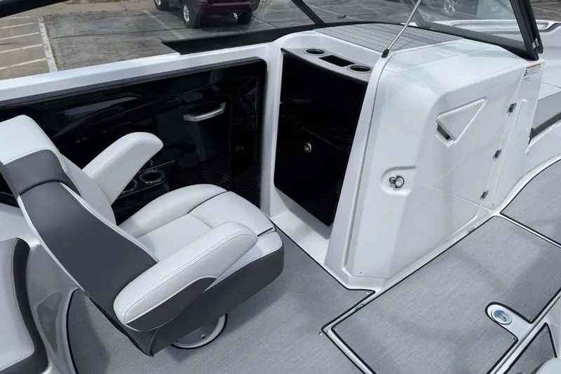 Slide: The Image of 2026 Yamaha Boats AR250 interior with sleek seating and modern console design. - 10
