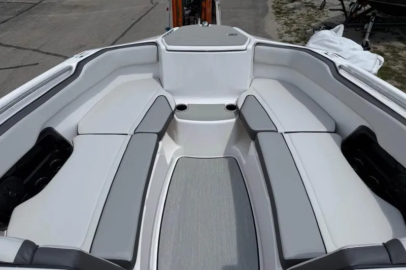 Slide: The Image of Interior of 2026 Yamaha Boats AR250, featuring spacious seating and modern design. - 11
