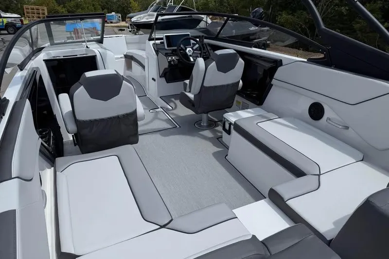 Slide: The Image of 2026 Yamaha Boats AR250 interior with modern seating and sleek design. - 6