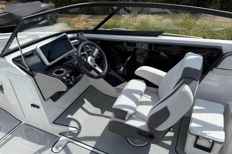Slide: The Image of 2026 Yamaha Boats AR250 cockpit with modern steering and seating design. - 8
