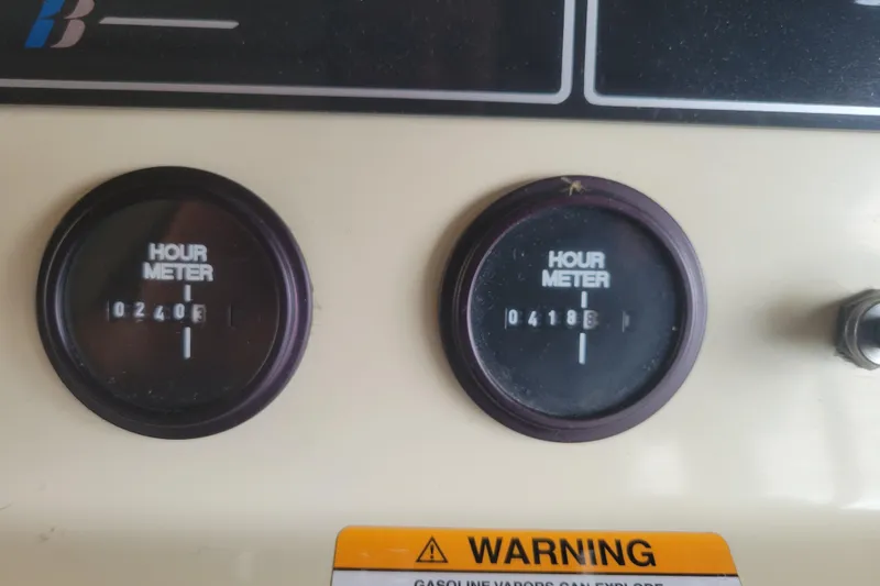 Slide: The Image of Hour meters on 1981 Bayliner 3270 Explorer dashboard, showing 2403 and 4198 hours. - 15