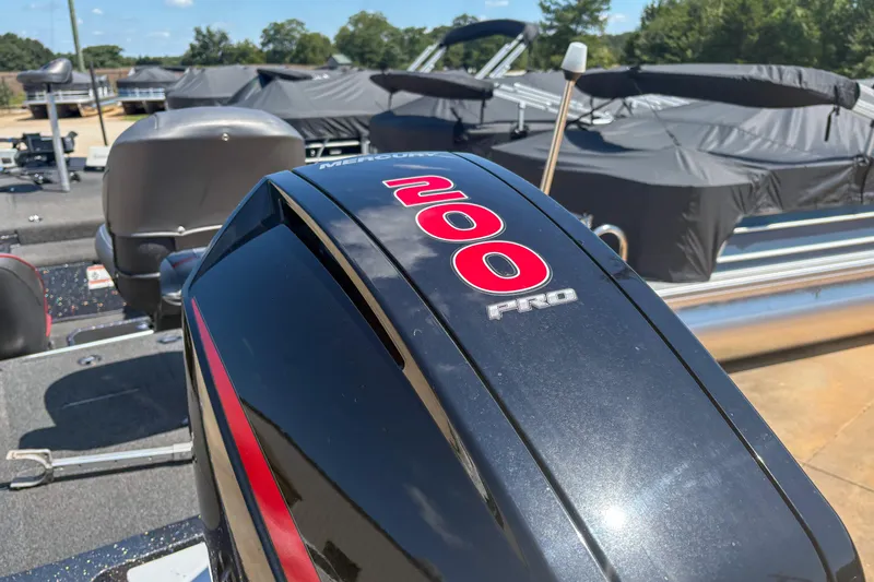 Slide: The Image of Nitro Z19 2021 boat with Mercury 200 Pro outboard engine, docked outdoors. - 14
