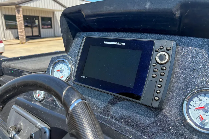 Slide: The Image of Dashboard of a 2021 Nitro Z19 boat featuring a Humminbird Helix 8 fish finder. - 15