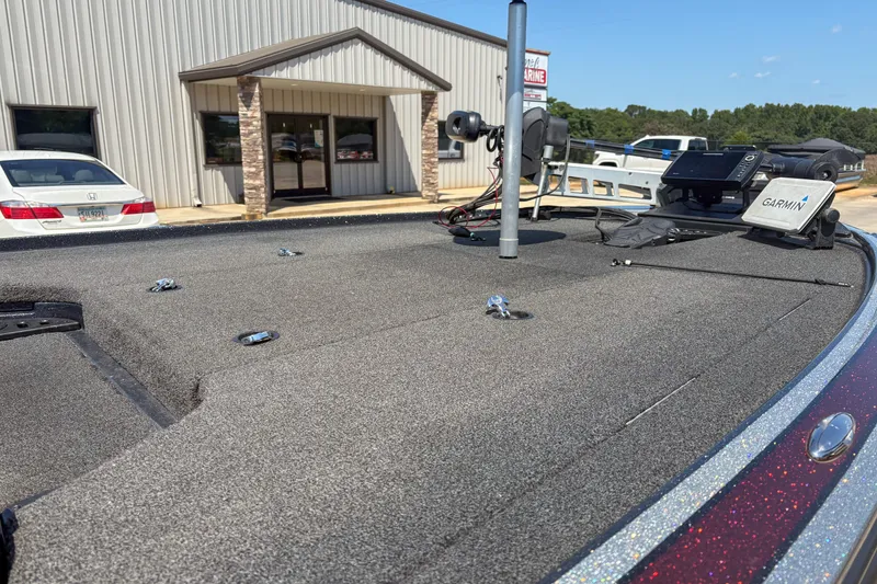 Slide: The Image of 2021 Nitro Z19 boat deck with Garmin equipment outside a building. - 6