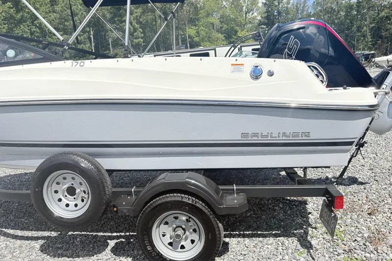 Slide: The Image of 2020 Bayliner 170 Bowrider on trailer, side view, outdoors. - 18