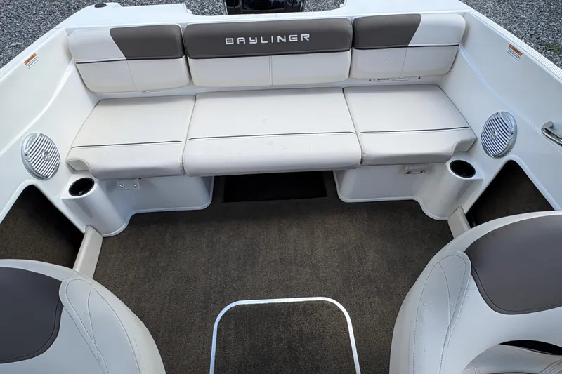 Slide: The Image of 2020 Bayliner 170 Bowrider interior with cushioned seating and cup holders. - 19