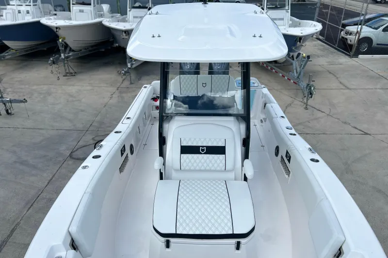 Slide: The Image of 2026 Sea Fox 268 Commander boat with sleek white interior and modern design. - 10