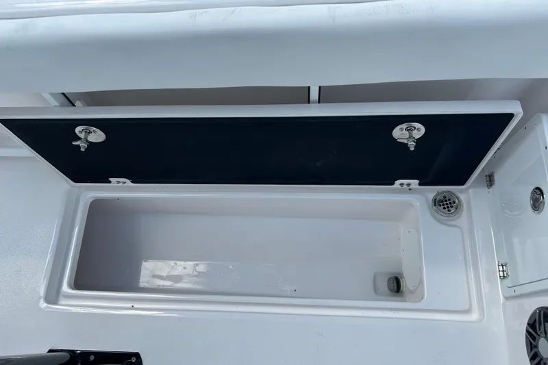 Slide: The Image of Open storage compartment on 2026 Sea Fox 268 Commander boat. - 33