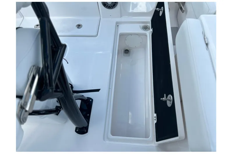 Slide: The Image of 2026 Sea Fox 268 Commander boat interior storage compartment, open lid, white and black design. - 34