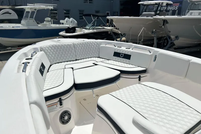 Slide: The Image of 2026 Sea Fox 268 Commander boat with luxurious white seating and sleek design. - 4