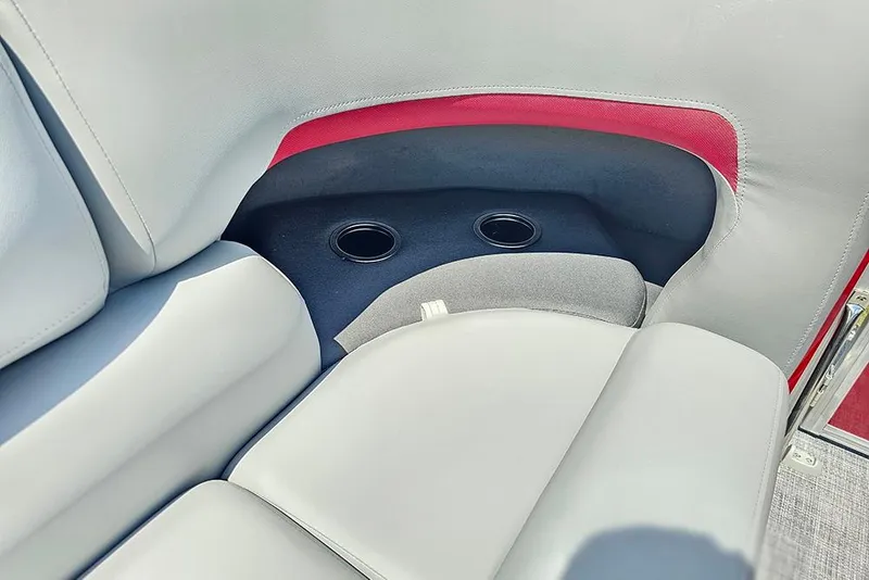 Slide: The Image of 2026 Sun Tracker Party Barge 20 DLX interior seating with cup holders. - 24