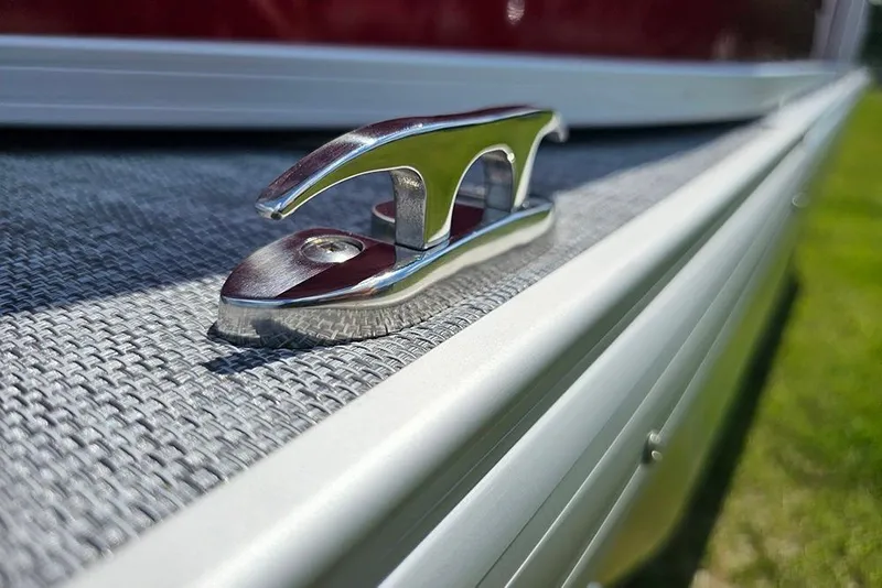 Slide: The Image of Close-up of a cleat on a 2026 Sun Tracker Party Barge 20 DLX pontoon boat. - 26