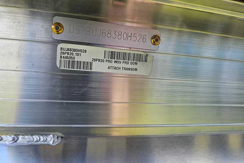 Slide: The Image of 2026 Sun Tracker Party Barge 20 DLX identification plate with serial number and barcode. - 27