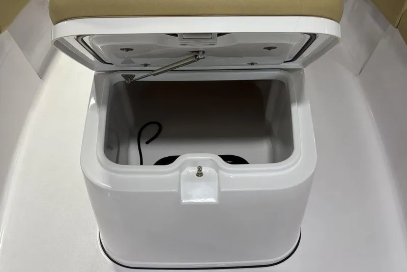 Slide: The Image of Open storage compartment in 2025 Sportsman Masters 267OE Bay Boat. - 10