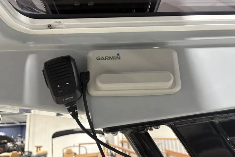 Slide: The Image of Garmin device installed on 2025 Sportsman Masters 267OE Bay Boat dashboard. - 17