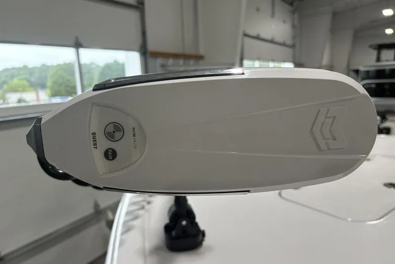 Slide: The Image of Close-up of 2025 Sportsman Masters 267OE Bay Boat's advanced control panel in a garage setting. - 5