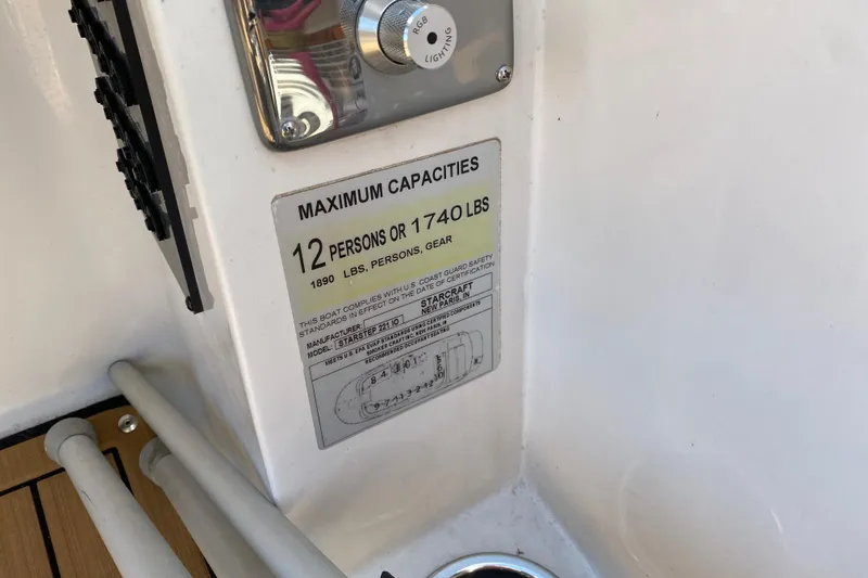 Slide: The Image of 2022 Starcraft Star Step 221 E I/O boat capacity label, 12 persons or 1740 lbs. - 10