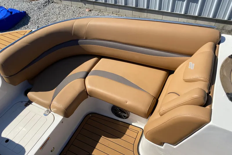 Slide: The Image of Luxurious tan seating on 2022 Starcraft Star Step 221 E I/O boat. - 14