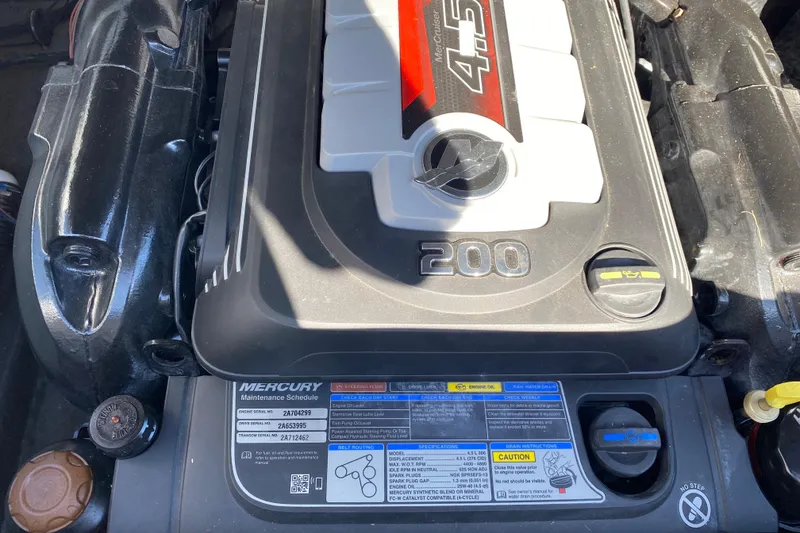 Slide: The Image of Engine of 2022 Starcraft Star Step 221 E I/O boat, featuring Mercury 4.5L 200 HP. - 21