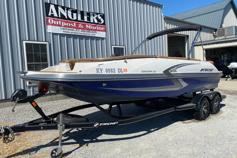 Slide: The Image of 2022 Starcraft Star Step 221 E I/O boat on trailer at Angler's Outpost & Marine. - 3