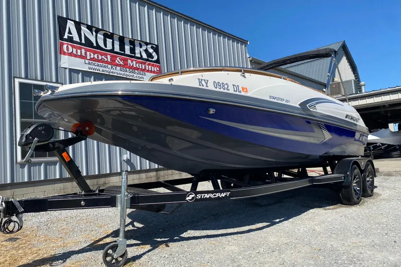 Slide: The Image of 2022 Starcraft Star Step 221 E I/O boat on trailer at Angler's Outpost & Marine. - 4