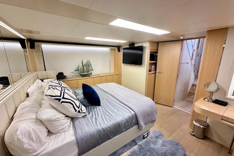 Slide: The Image of Luxurious bedroom interior of 2016 Absolute 72 FLY yacht with modern decor and cozy bedding. - 101