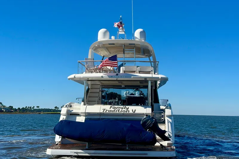 Slide: The Image of Luxury yacht Absolute 72 FLY 2016 cruising on open water under clear blue sky. - 11