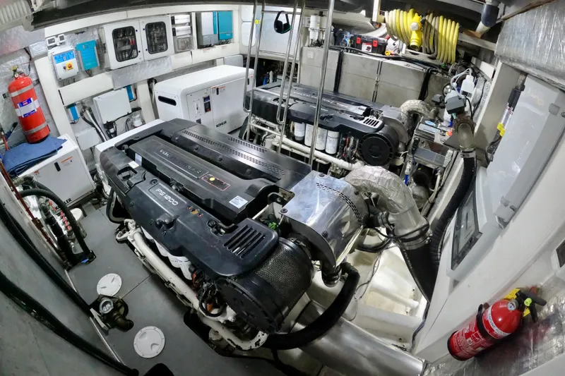 Slide: The Image of Engine room of a 2016 Absolute 72 FLY yacht, featuring advanced machinery and equipment. - 121